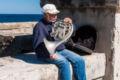 Músico en el Malecón.